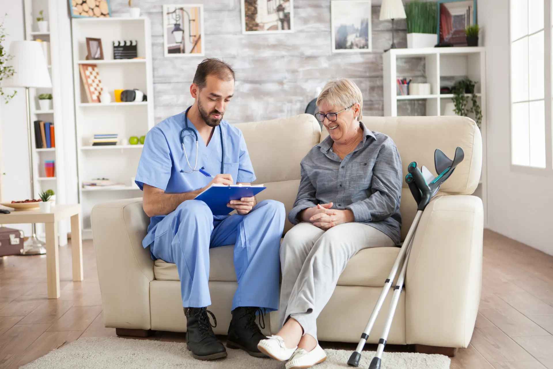 Doctor and senior patient laughing together